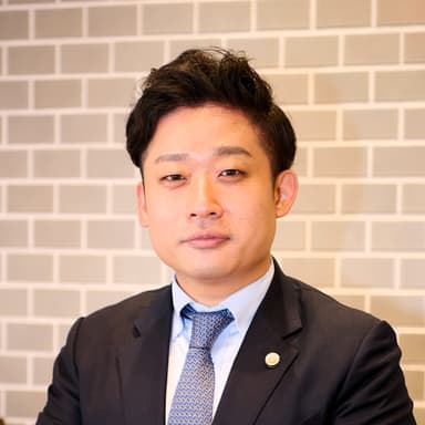 安藤雄起弁護士の写真